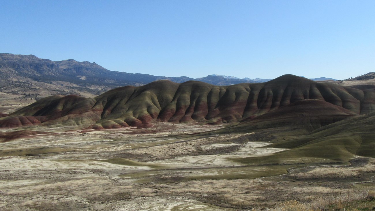 Red and green striped hills viewed from the Painted Hills Overlook Trail