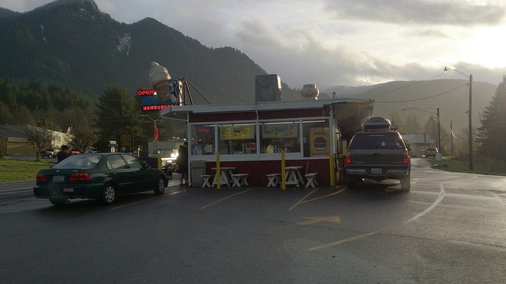 Eastwind Drive In. Photo by Andrew H via Yelp. The outside of Eastwind Drive-In on a cloudy day.