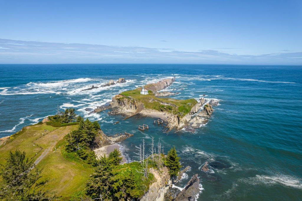 The Cape Arago Lighthouse on an island in the Pacific Ocean.