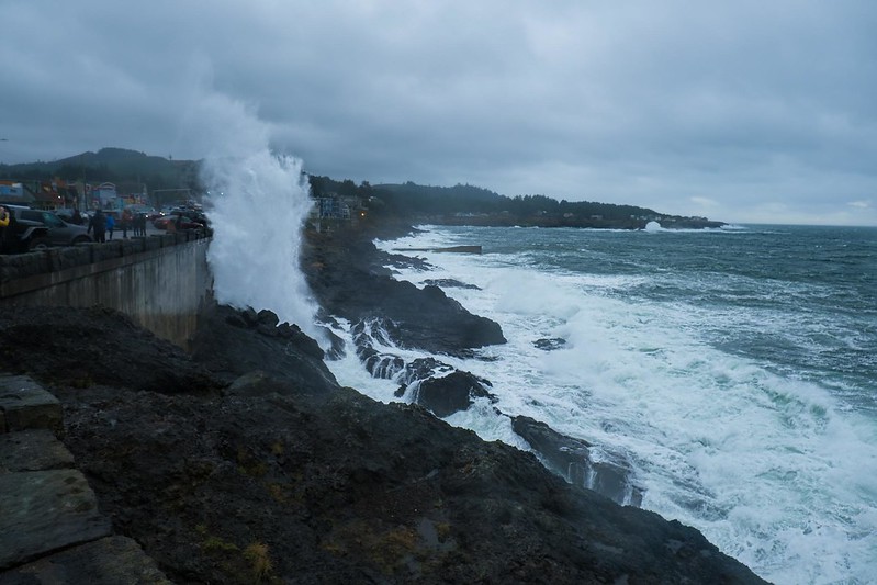 King Tides In Depoe Bay On December 4th, 2021. Photo by David Paull via Oregon King Tides via Flickr CC2. Massive King Tide Wave hitting a rock on the Oregon coast on a stormy day