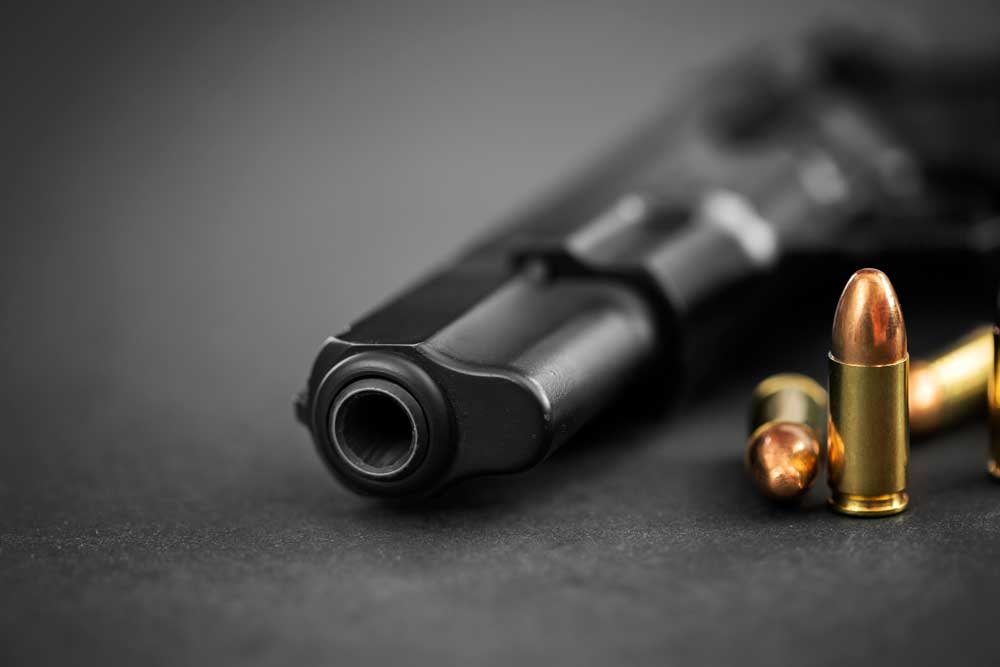 handgun-with-ammunition-2021-08-26-15-36-39-utc