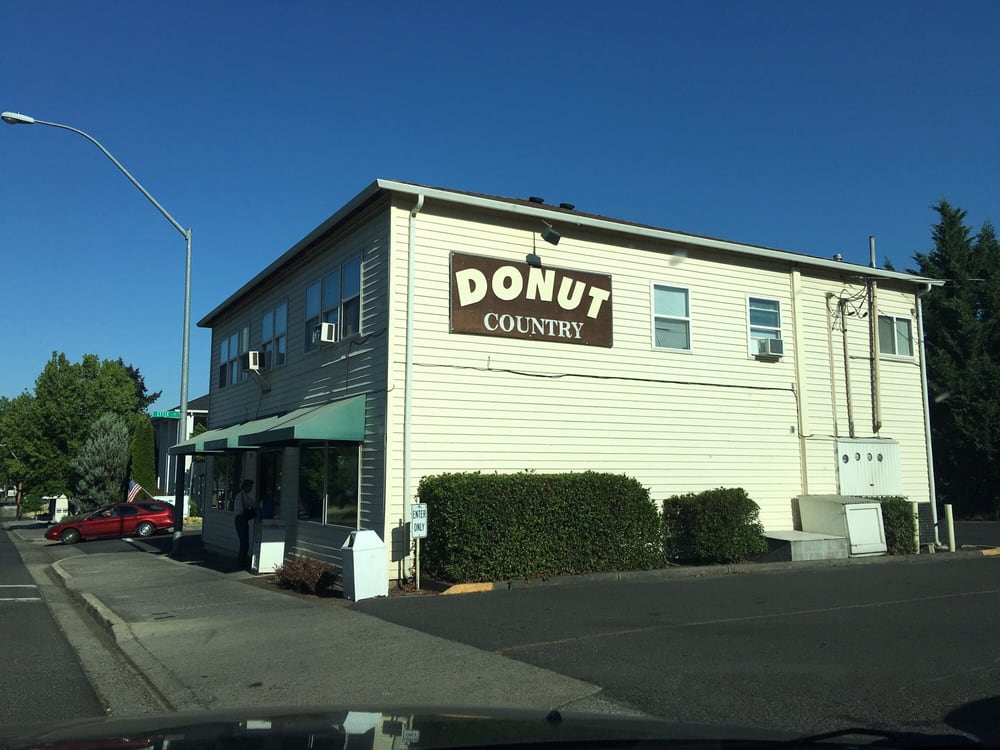 exterior Norm L. Yelp Donut Country building