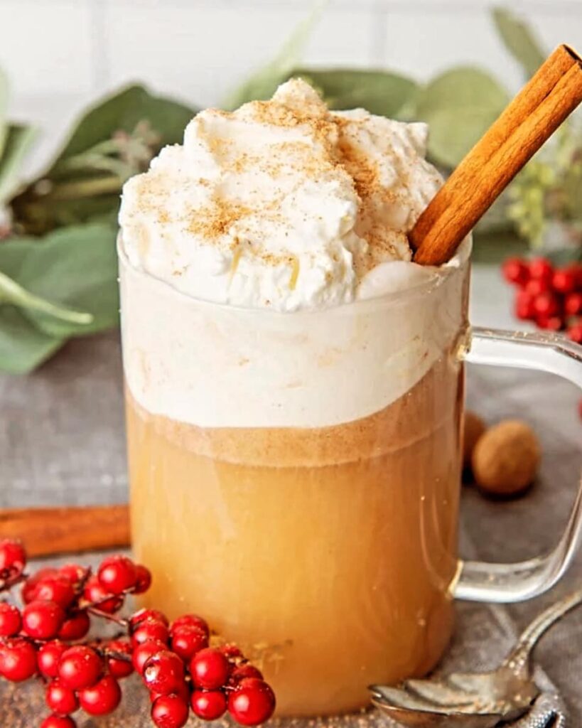 A creamy frozen drink with white custard on top.