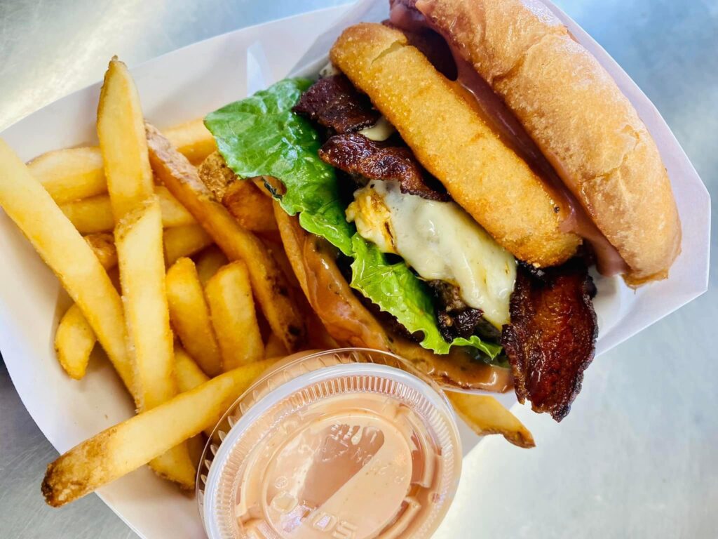 A delicious cheeseburger and fries.