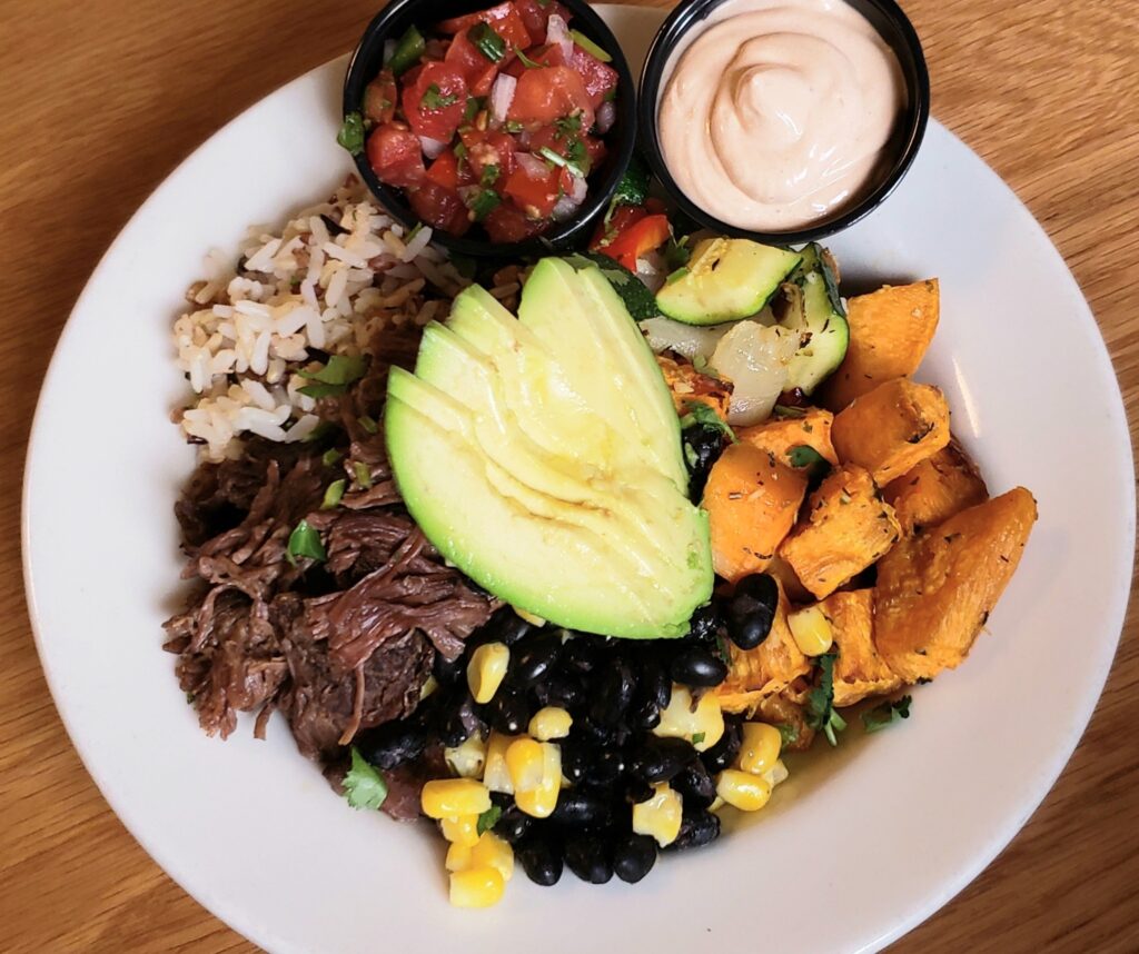 Banning's Restaurant, Tigard Oregon, Good Eats, Comfort Food, Best Places To Eat, Famous Pie House, Old School Diners, Portland Area, Where to Eat in Tigard, The braised beef bowl. It has shredded meat, beans, corn, other vegetables, and sliced avocado on top.