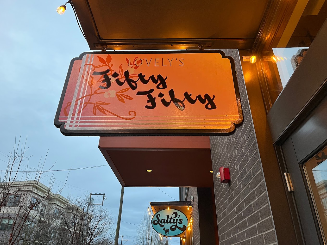 Featured, Daja Phillips Google Local Lovely's Fifty Fifty sign