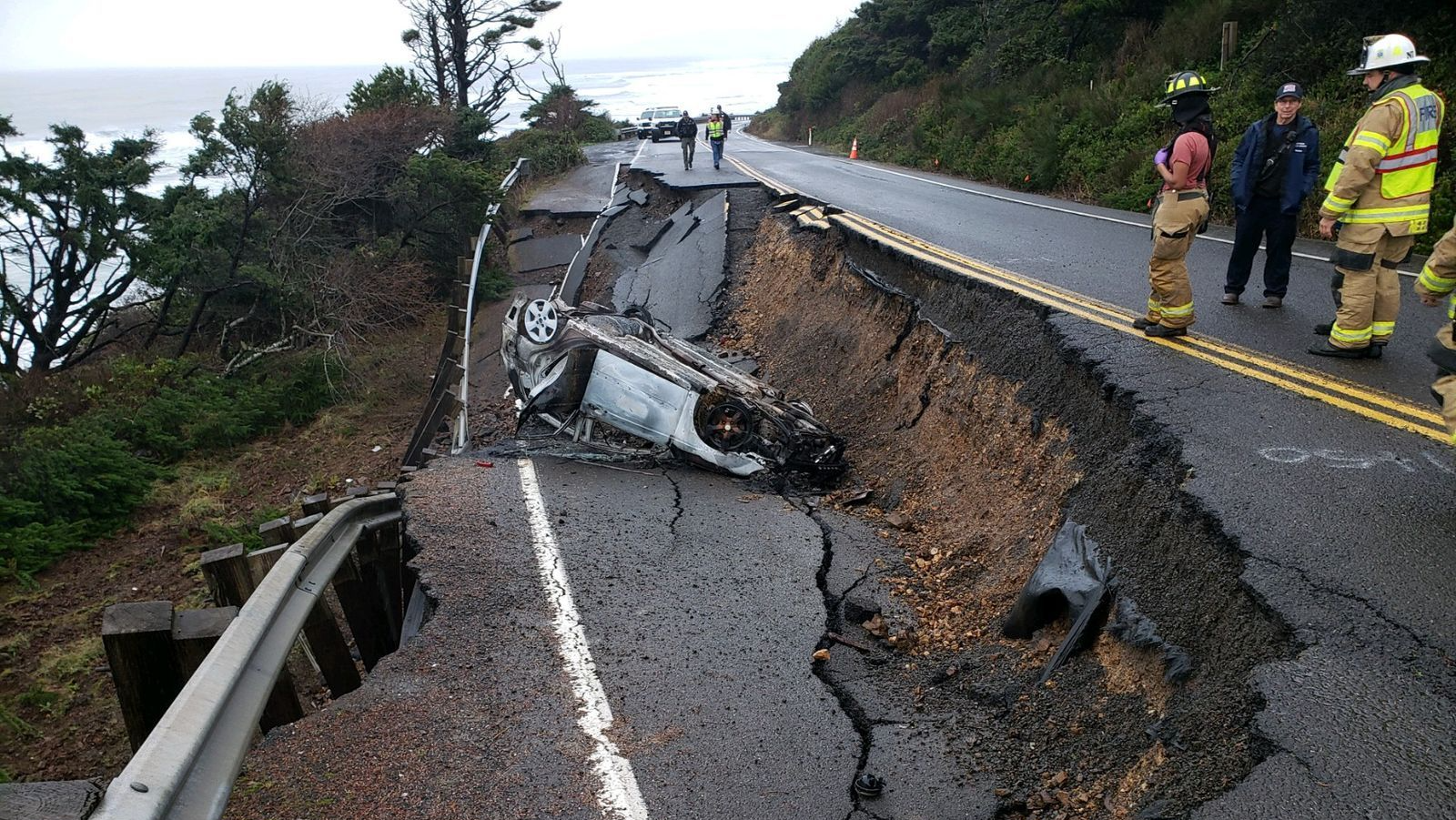 Oregon Coast Driver Takes Down Road Closure Barrier, Plunges Headfirst Into Highway Hole