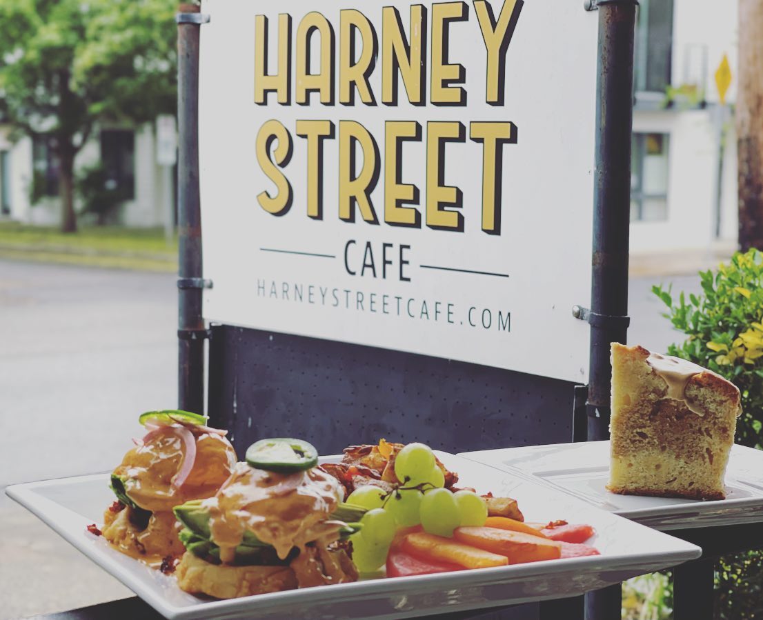 Photo via the Harney Street Cafe Facebook page A tasty looking plate of fresh food in front of the white and Black Harney Street Cafe sign.