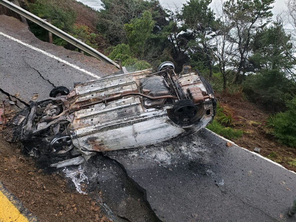tillamook car crash, highway sinkhole, oregon, stupid driving, road closure, tillamook county sheriff's office, car fire
