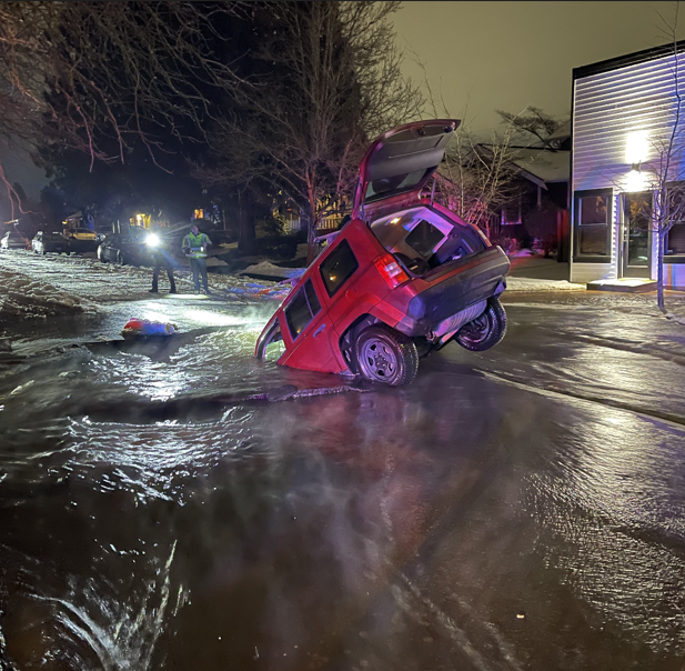vehicle plunging into sinkhole