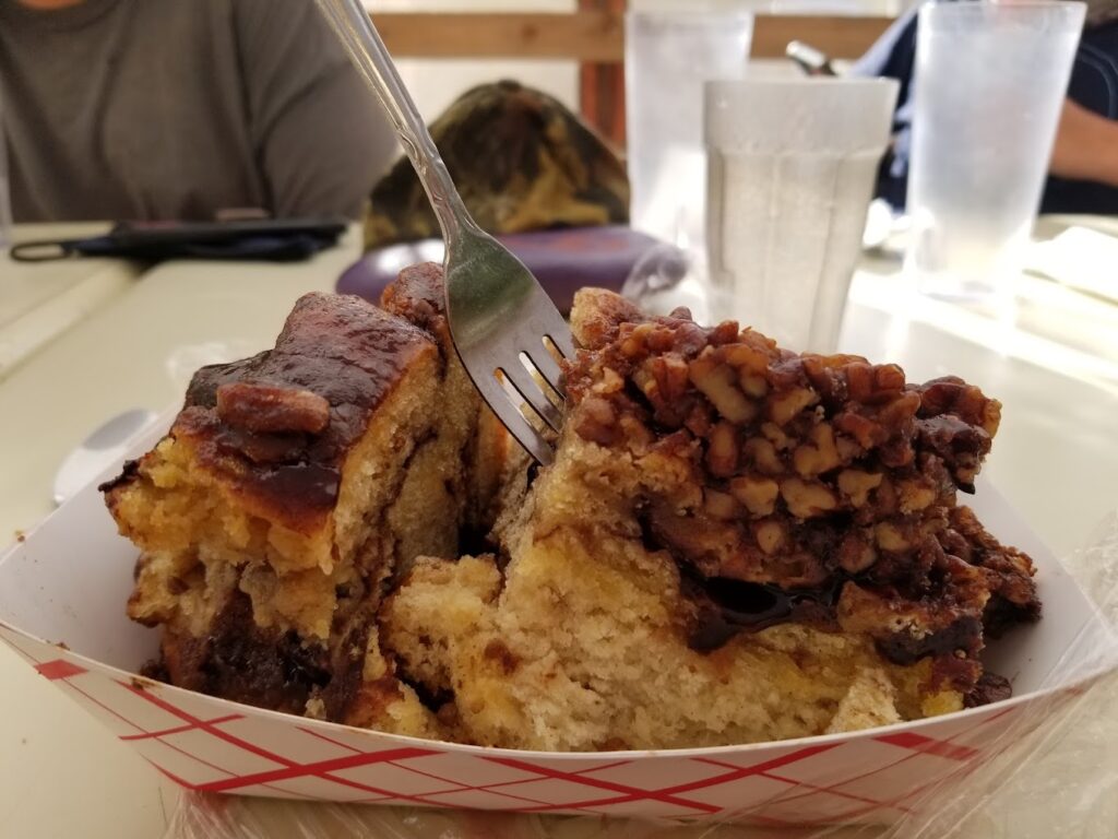 A cinnamon roll cut in half.