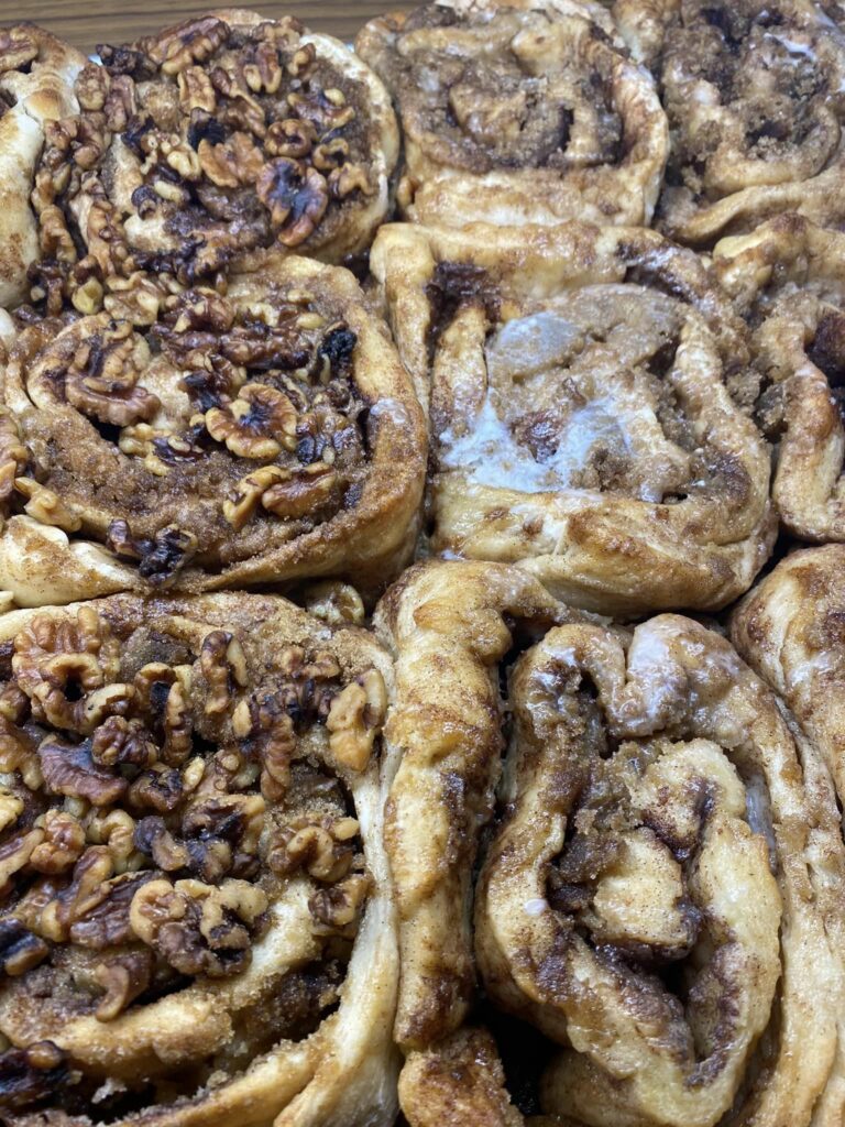 A tray of freshly baked cinnamon rolls.