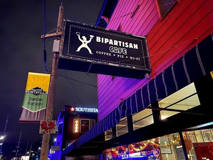 large-AF1QipNqOZS1GAqWGDDxW_svnr1Aq1qH The outside of the Bipartisan Cafe at night.
