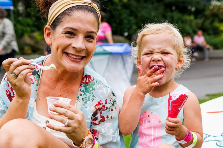 Photo via the Scooped Ice Cream Festival Instagram. A mother and her child enjoy delicious ice cream.
