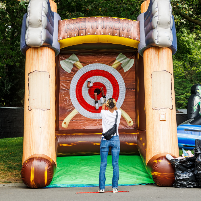 A woman plays a festival game.