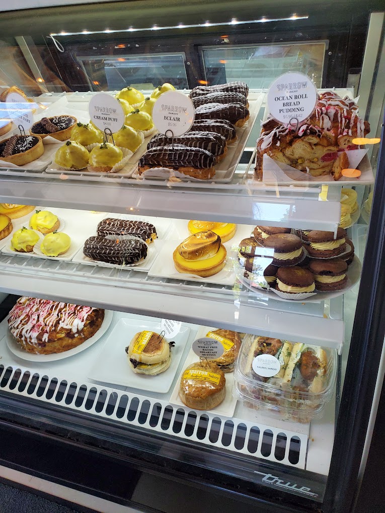 Delicious baked goods inside a glass display. They're so pretty!