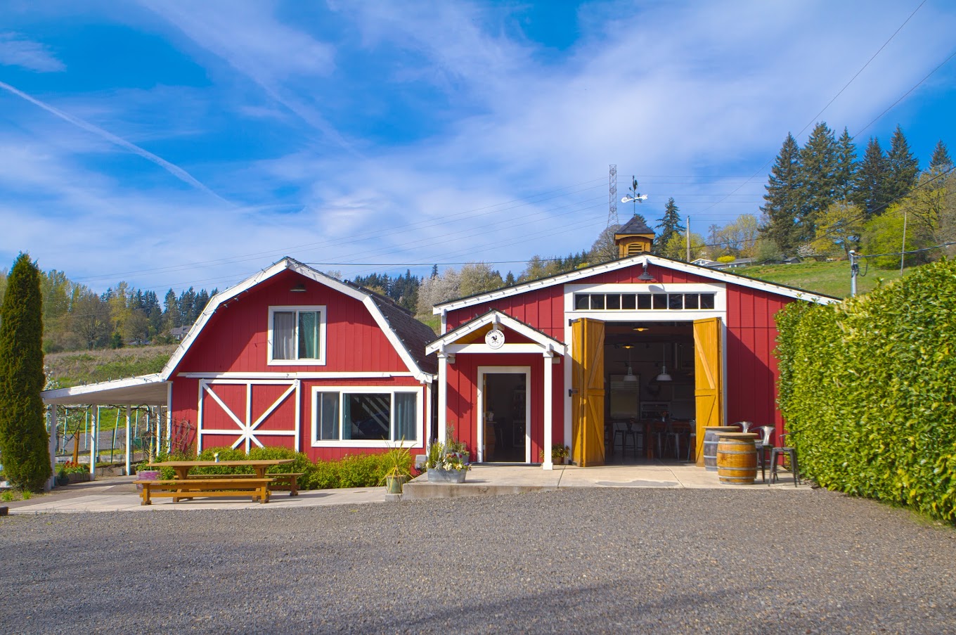 Photo by The Kitchen At Middleground Farms via Google Local. The outside of The Kitchen At Middleground Farms. It's a red barn next to a red building. It's cute.