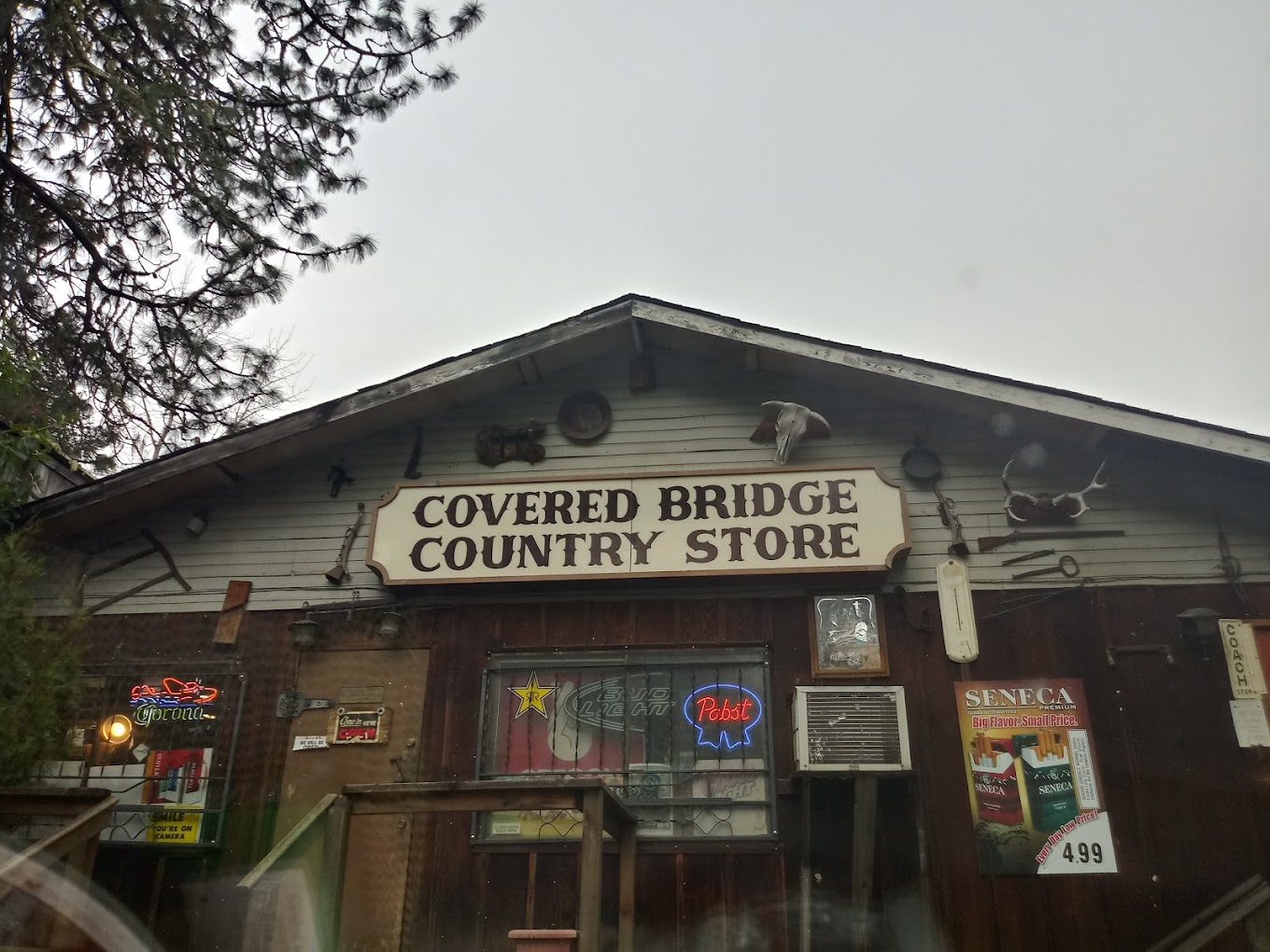 Photo by Crystal Navarrette-Gibson via Google Local. The outside of the Covered Bridge Country store.