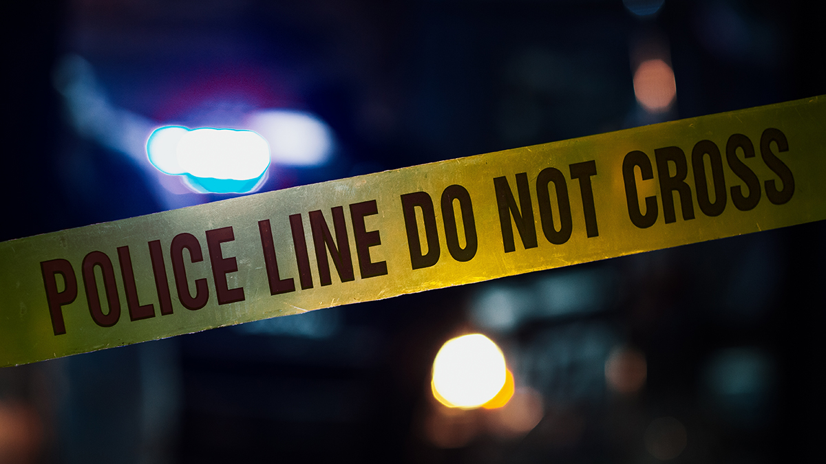 Close,Up,Shot,Focused,On,Yellow,Tape,Showing,Text,”police police line do not cross