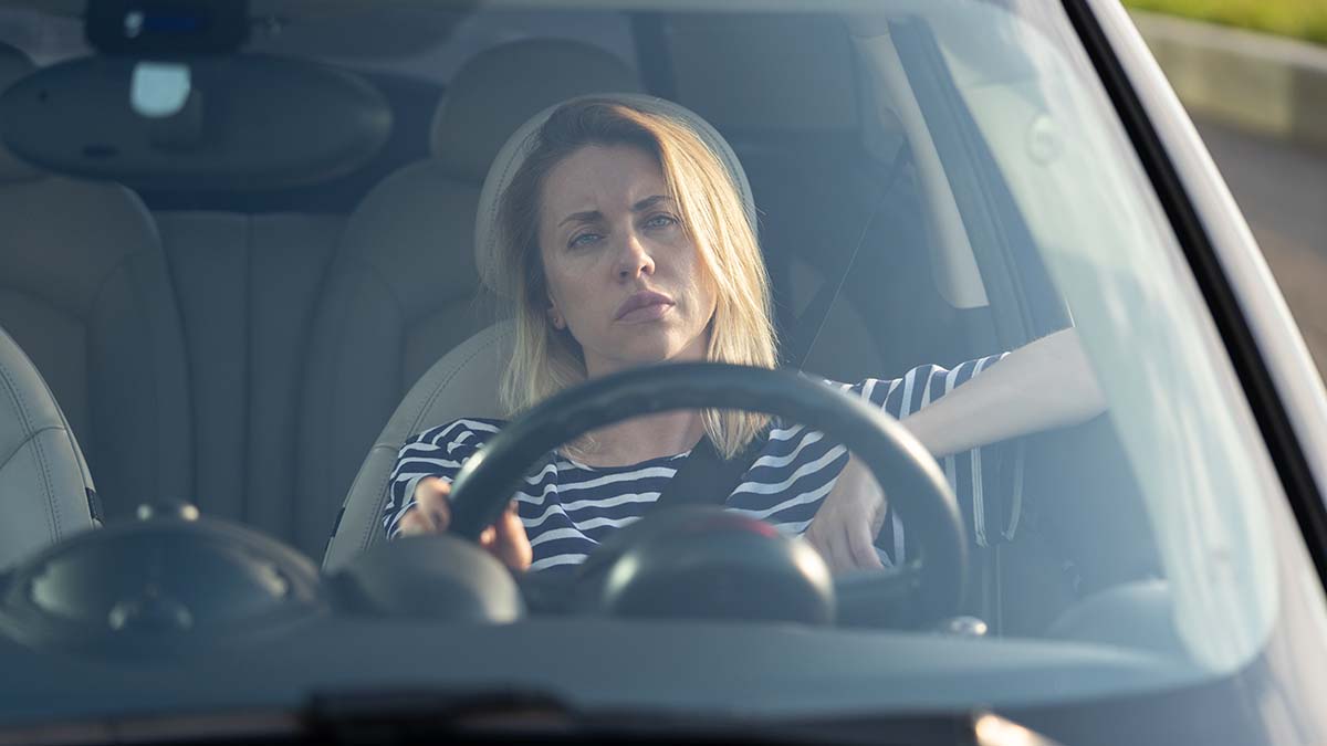 Bored,Woman,Irritated,Driving,Car.,Tired,Unhappy,Female,Driver,Sitting bored driver