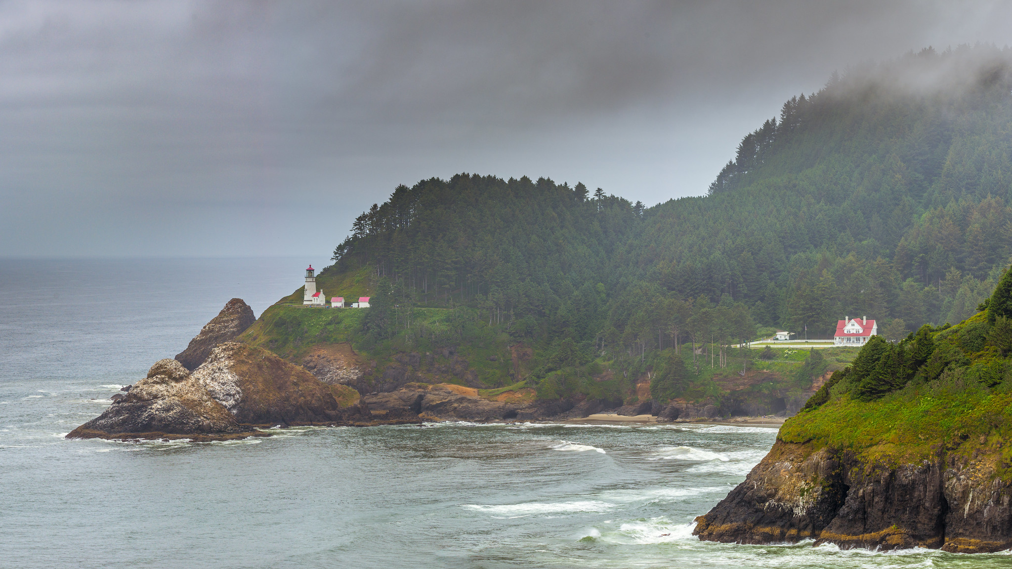 Photo by Jim Bauer via Flickr, CC2. Heceta Head on a foggy day.