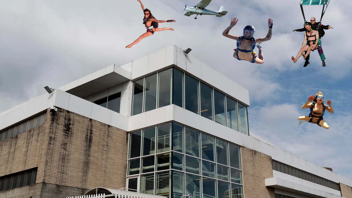 featured_naked_ice_building2 Photo of naked protesters skydiving over the Portland ICE building with a small Cessna plane in the background