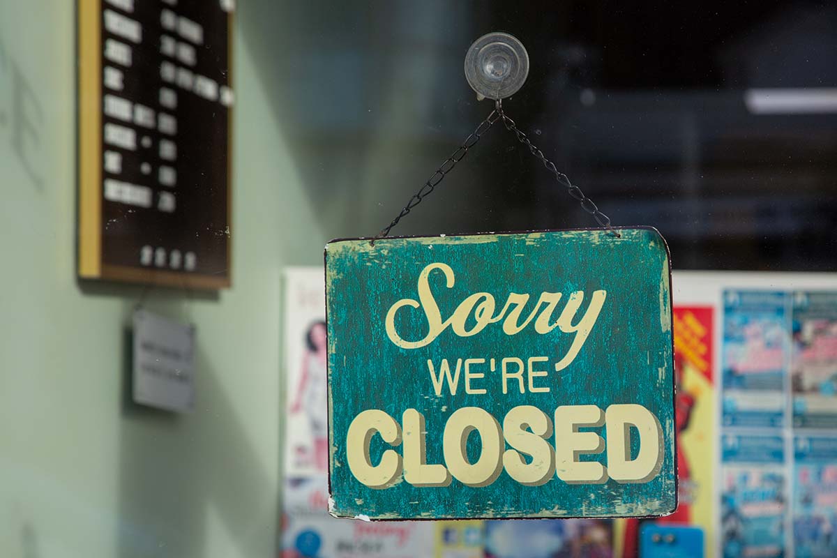 A,Sign,Hanging,In,A,Shop,Window,Saying,Sorry,We A sign hanging in a shop window saying sorry we are closed