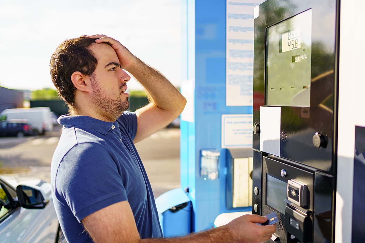 Caucasian,Young,Man,Surprised,By,High,Fuel,Prices,On,The