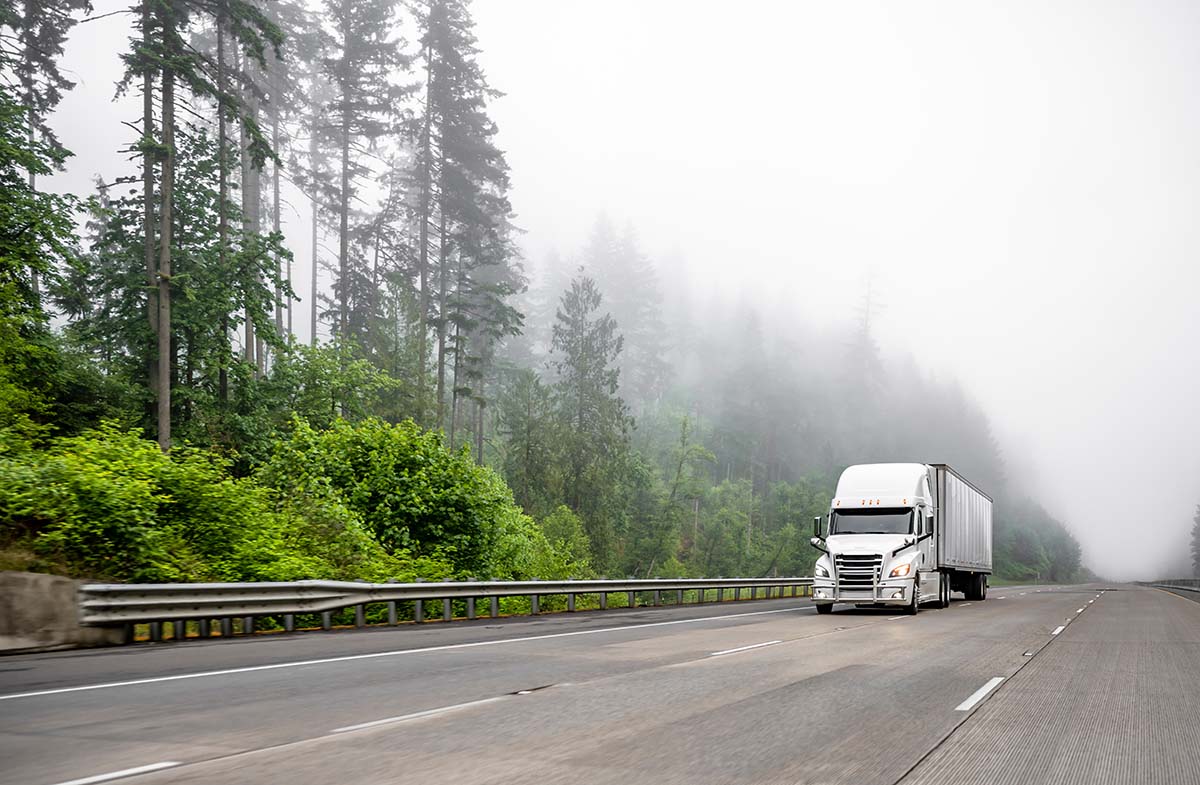 White,Big,Rig,Long,Haul,Semi,Truck,Transporting,Commercial,Cargo semi truck