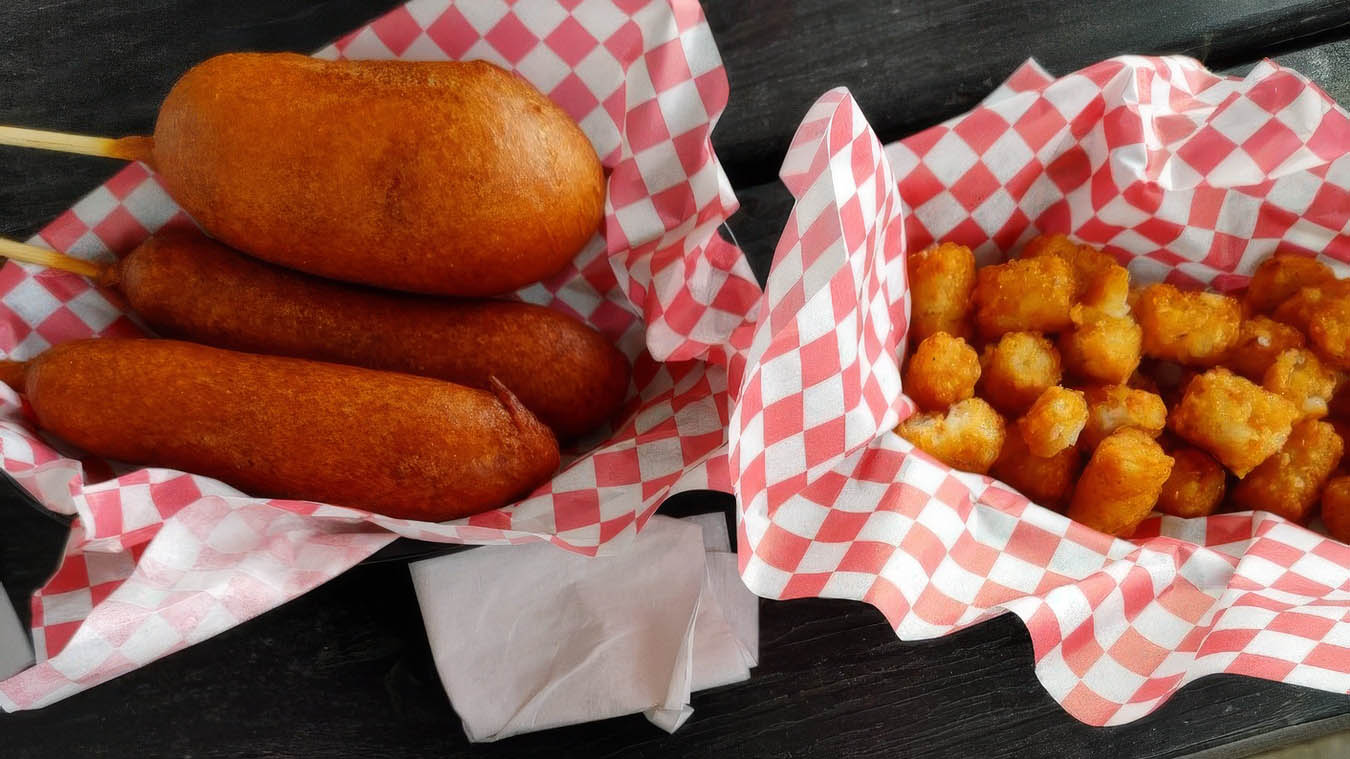 Screenshot 2026-05-28 150035-topaz-standard v2-1350w–cover Tater Tots. Corn Dogs, Invented in Oregon., The Original Pronto Pup, Ontario Tater Tots Festival, Ore-Ida Potatoes, Comfort Food, Restaurants, Rockaway Beach
